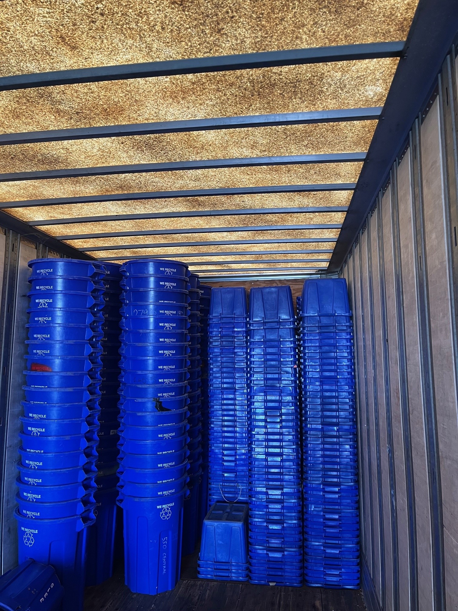 stacks of recycling bins