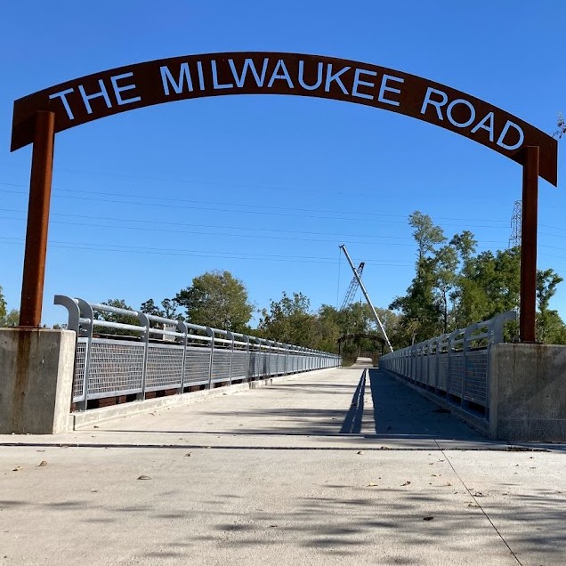trail with milwaukee road bridge overhead